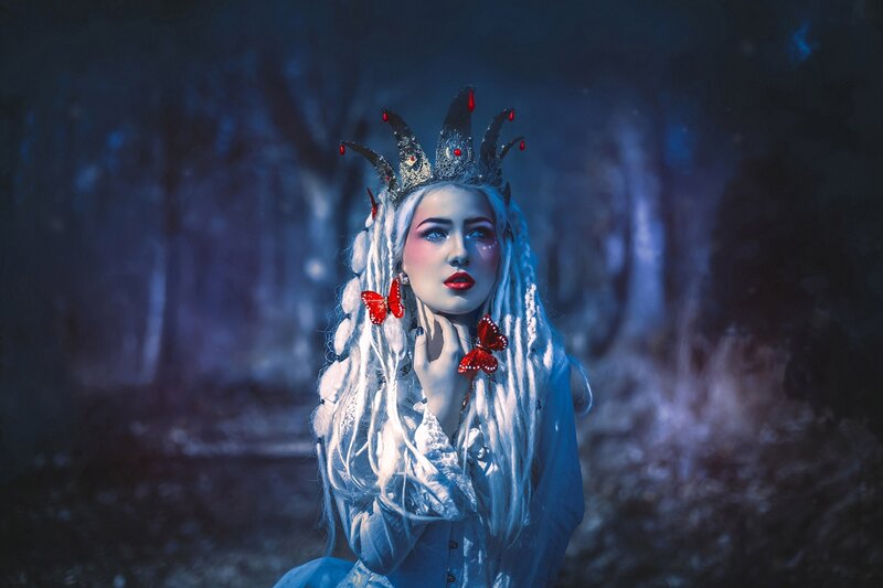 Woman in Crown and Costume