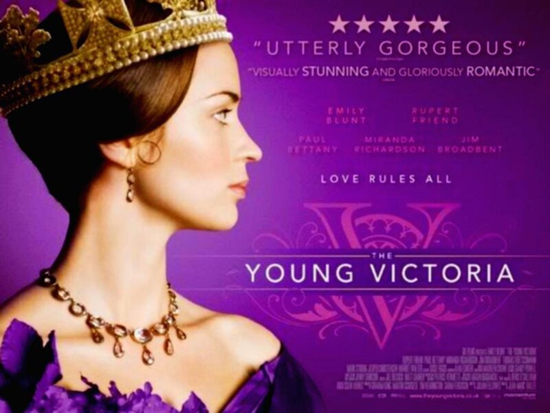 Woman in Crown and Purple Dress