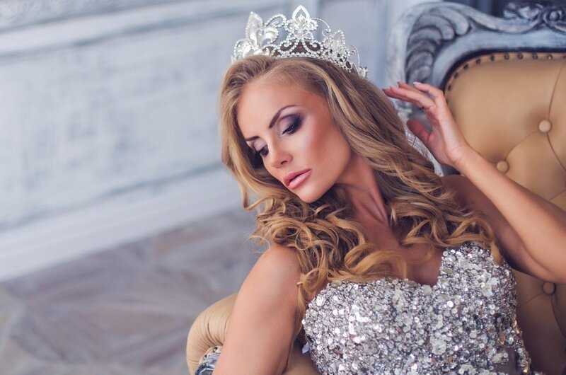 Woman in Crown and Sequin Dress