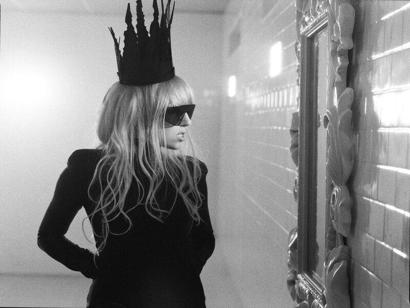 woman in crown and sunglasses