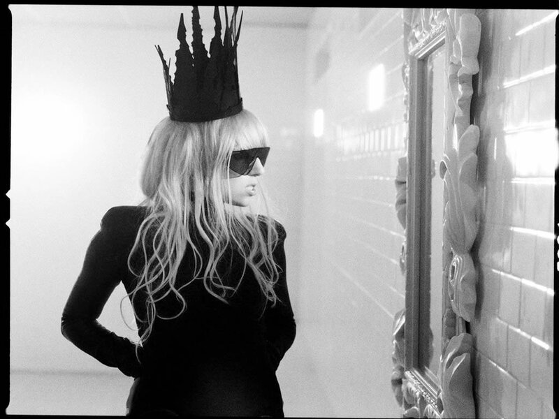 woman in crown and sunglasses