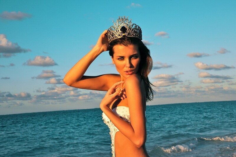 woman in crown at beach