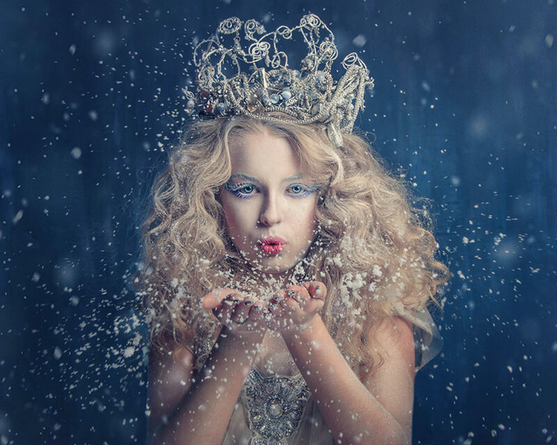 Woman in Crown Blowing Snow