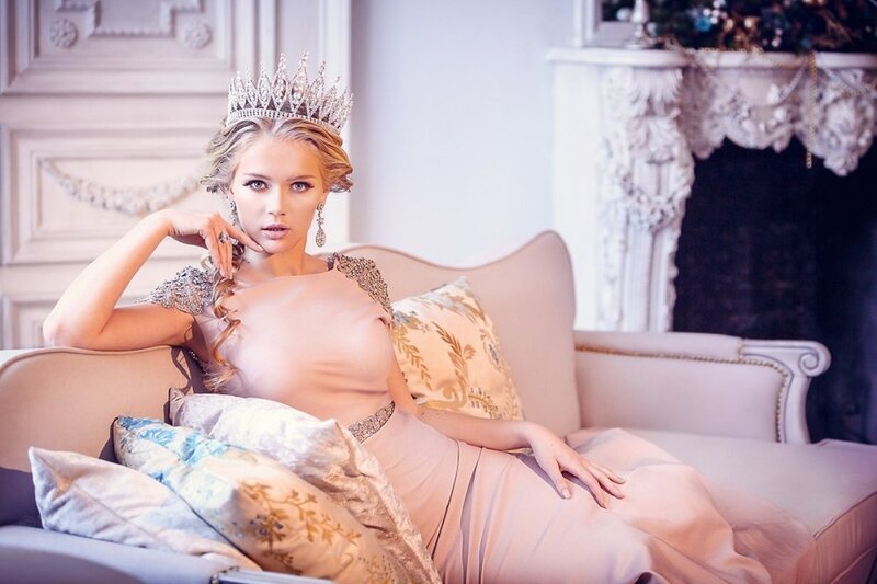 Woman in Crown on Couch