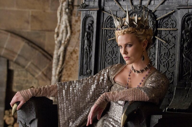 Woman in Crown Sitting