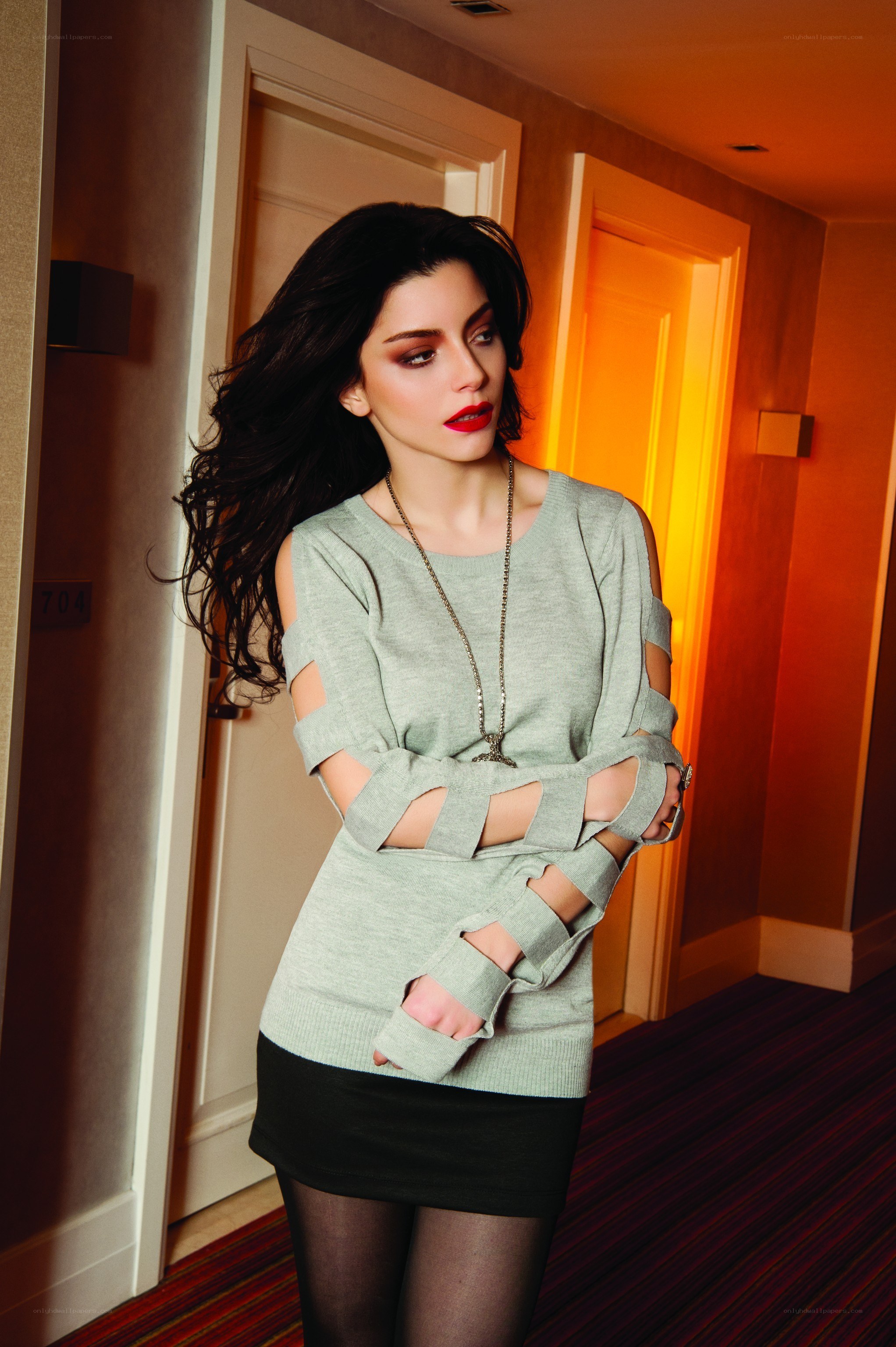 woman in cutout sweater
