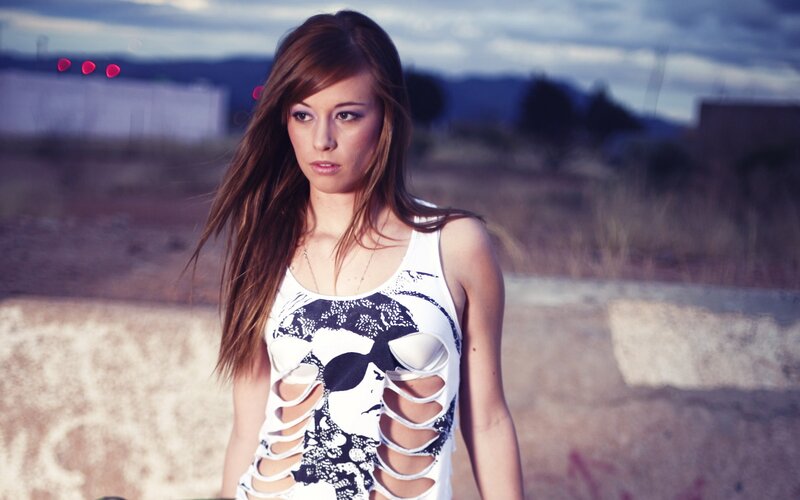 woman in cutout top outdoors