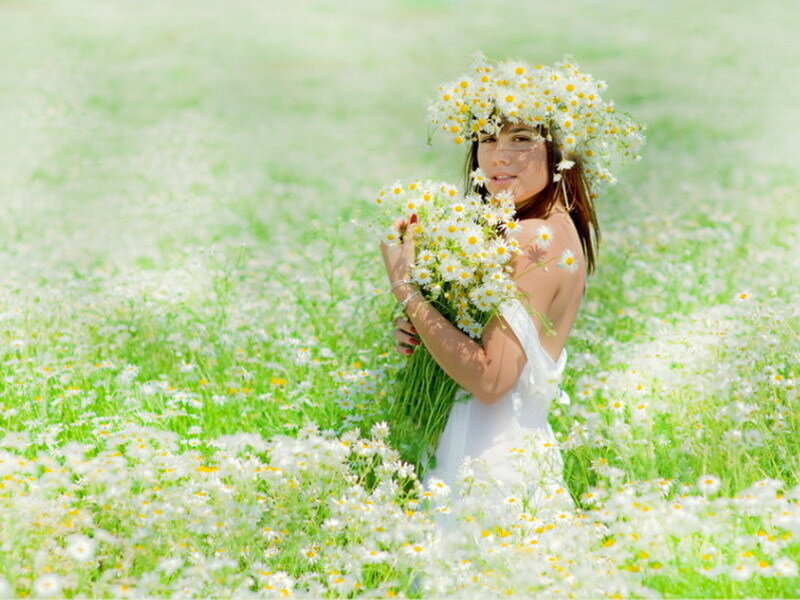 Woman in daisy field