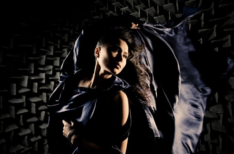 woman in dark blue fabric