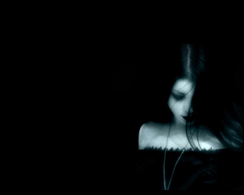 woman in dark blue light