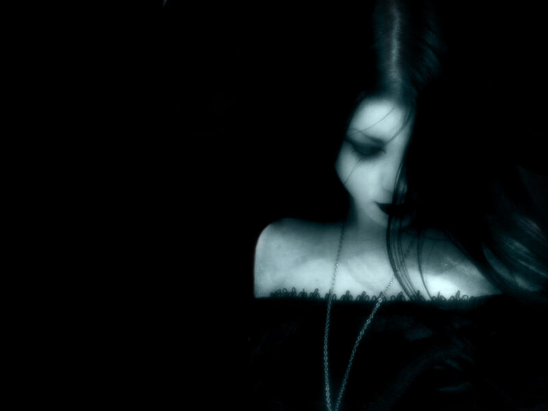 woman in dark blue tones