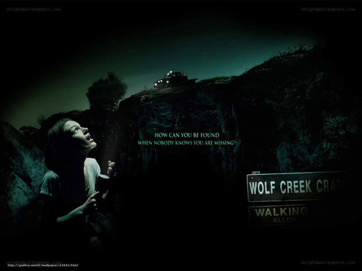 Woman in dark canyon