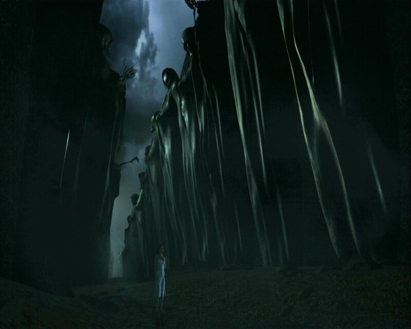 woman in dark cavern