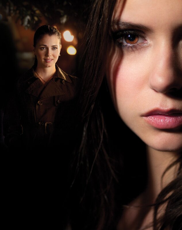 woman in dark coat close-up