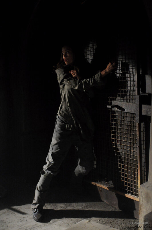 woman in dark corridor