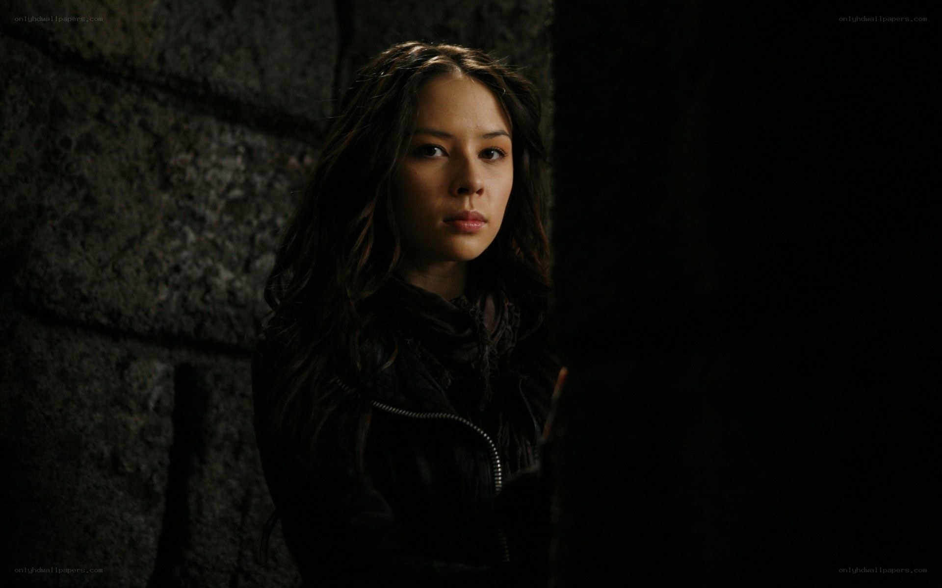 woman in dark corridor