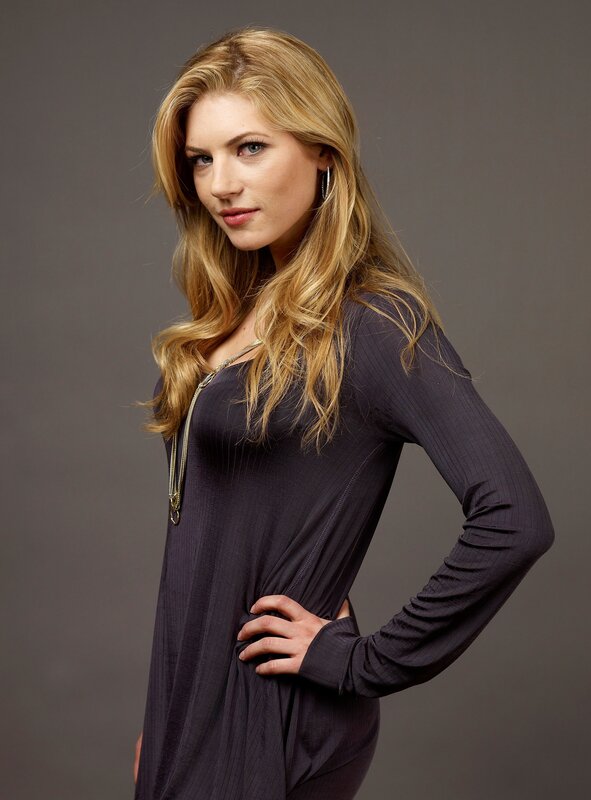 woman in dark dress posing