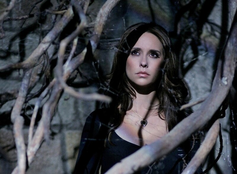 woman in dark forest