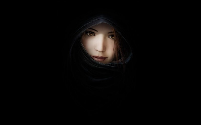 woman in dark hood