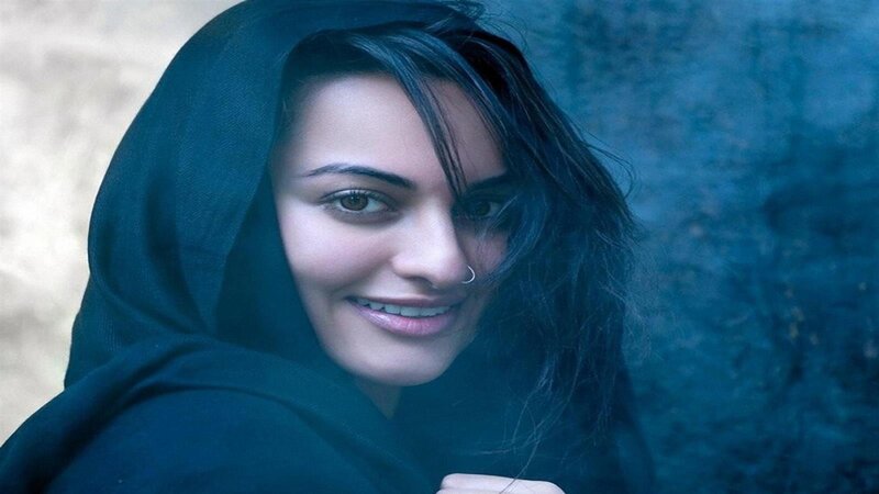Woman in Dark Hood — Blue