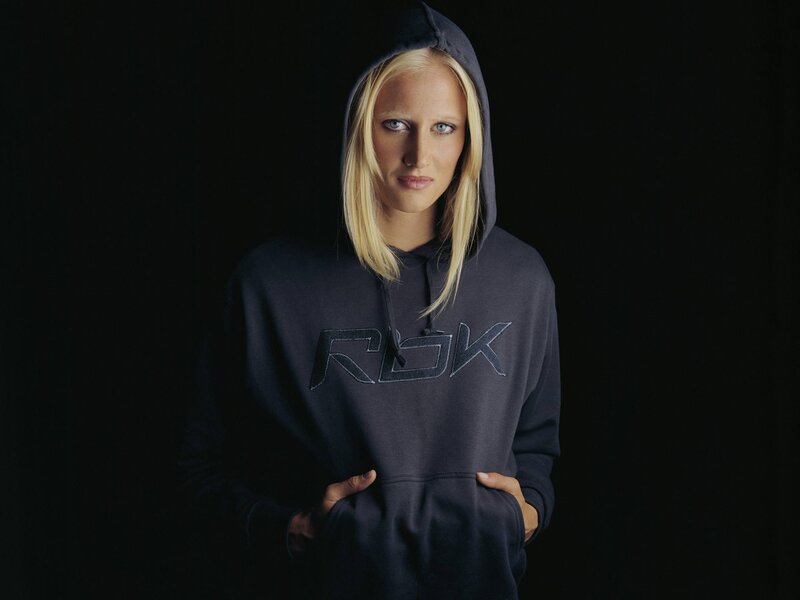woman in dark hoodie
