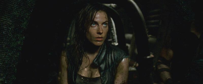 woman in dark industrial setting