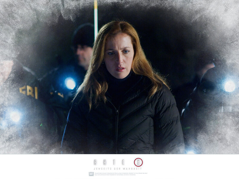 Woman in dark jacket at night scene