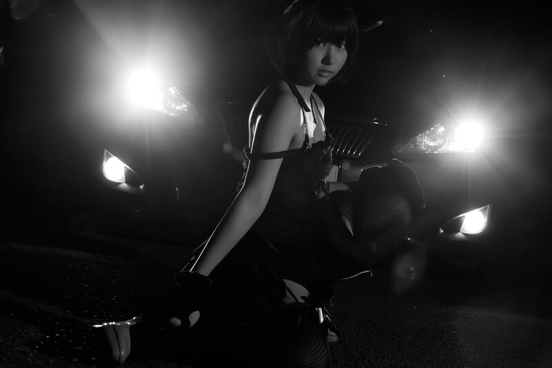 woman in dark outfit at night