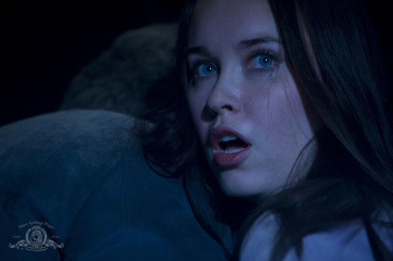 woman in dark room