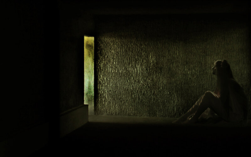 woman in dark room