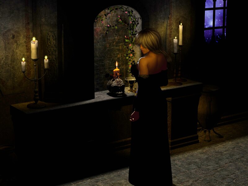 woman in dark room with candles