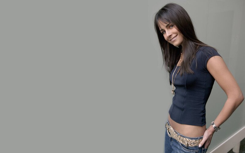 woman in dark top smiling
