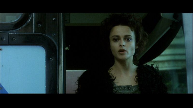 woman in dark vehicle interior