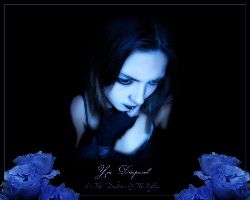 woman in darkness with roses