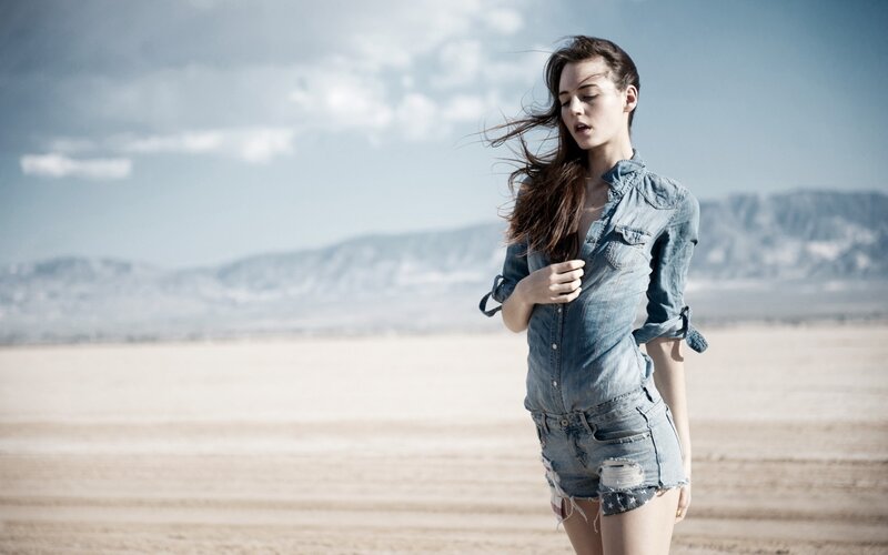 woman in denim at desert