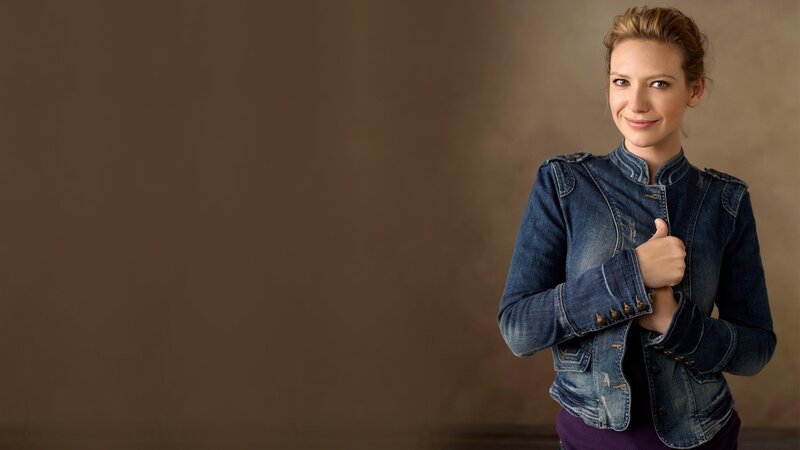 woman in denim jacket