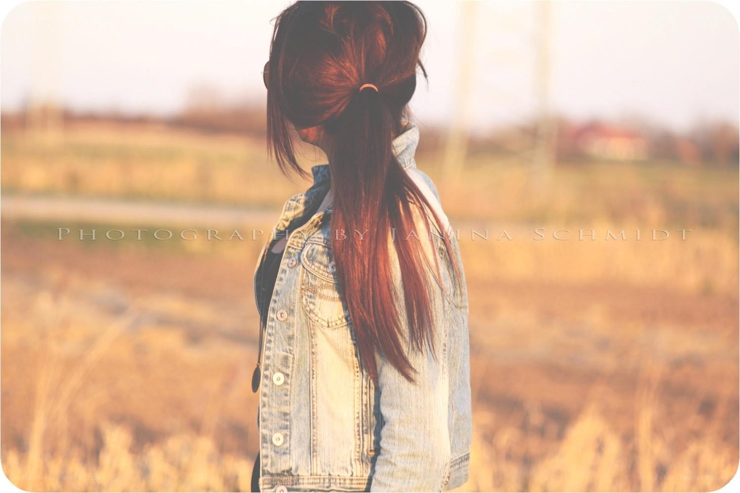 woman in denim jacket