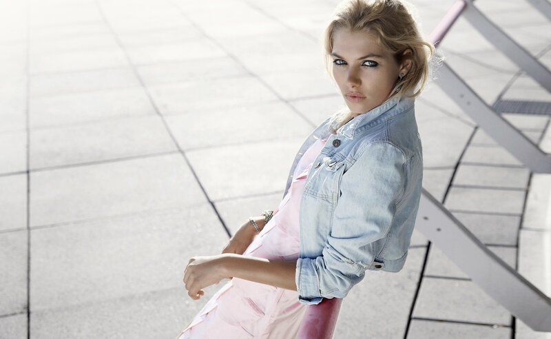 woman in denim jacket