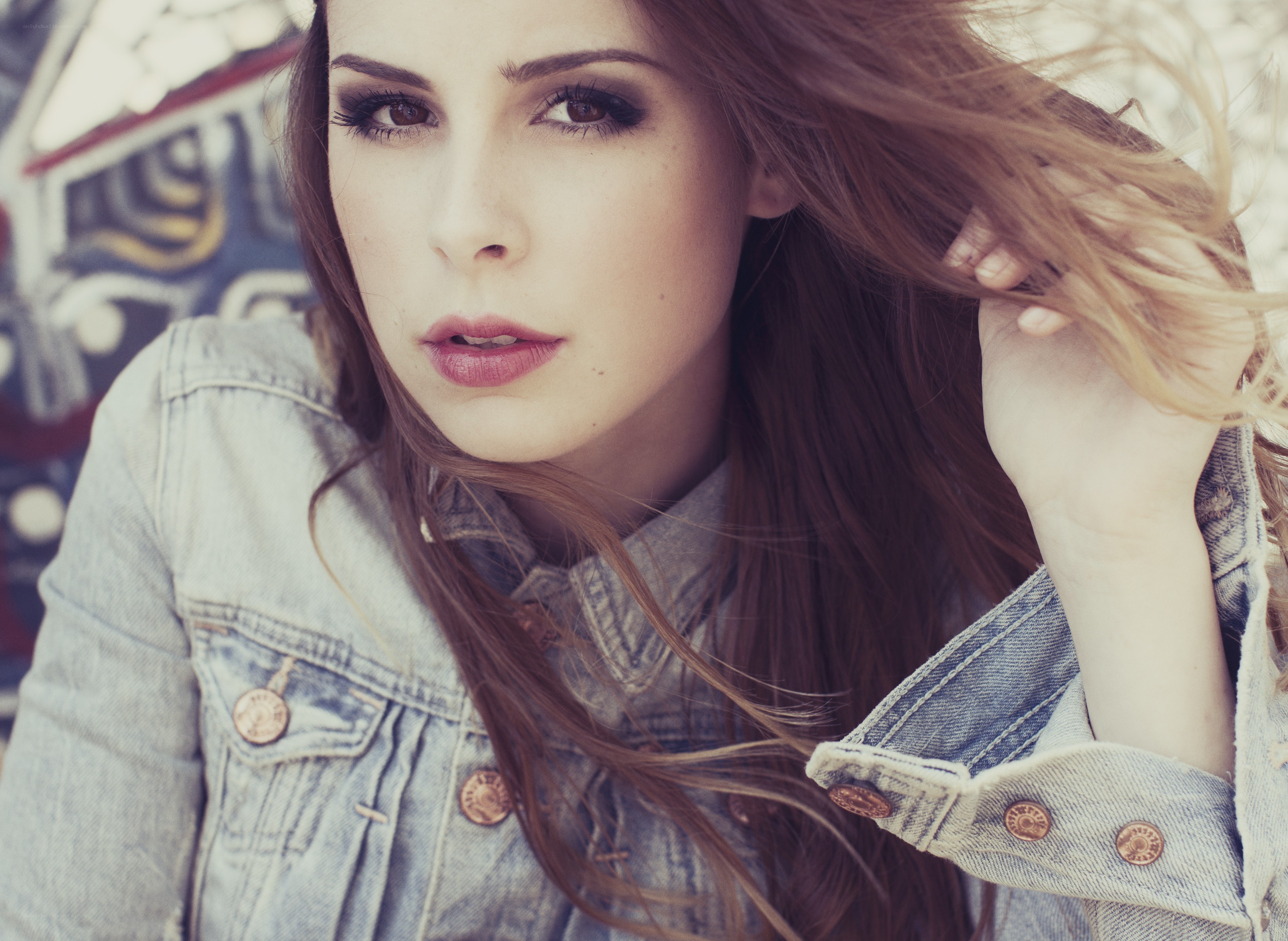 woman in denim jacket