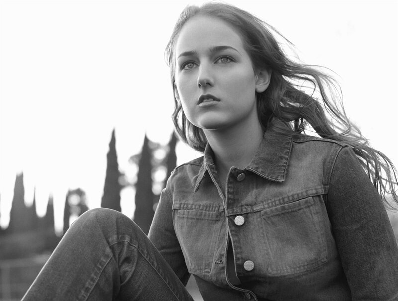 woman in denim jacket