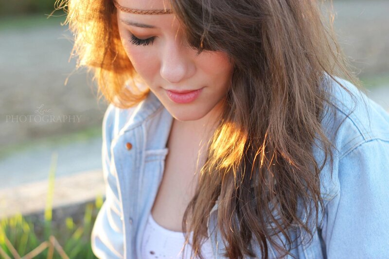 woman in denim jacket