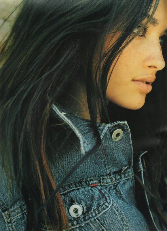woman in denim jacket