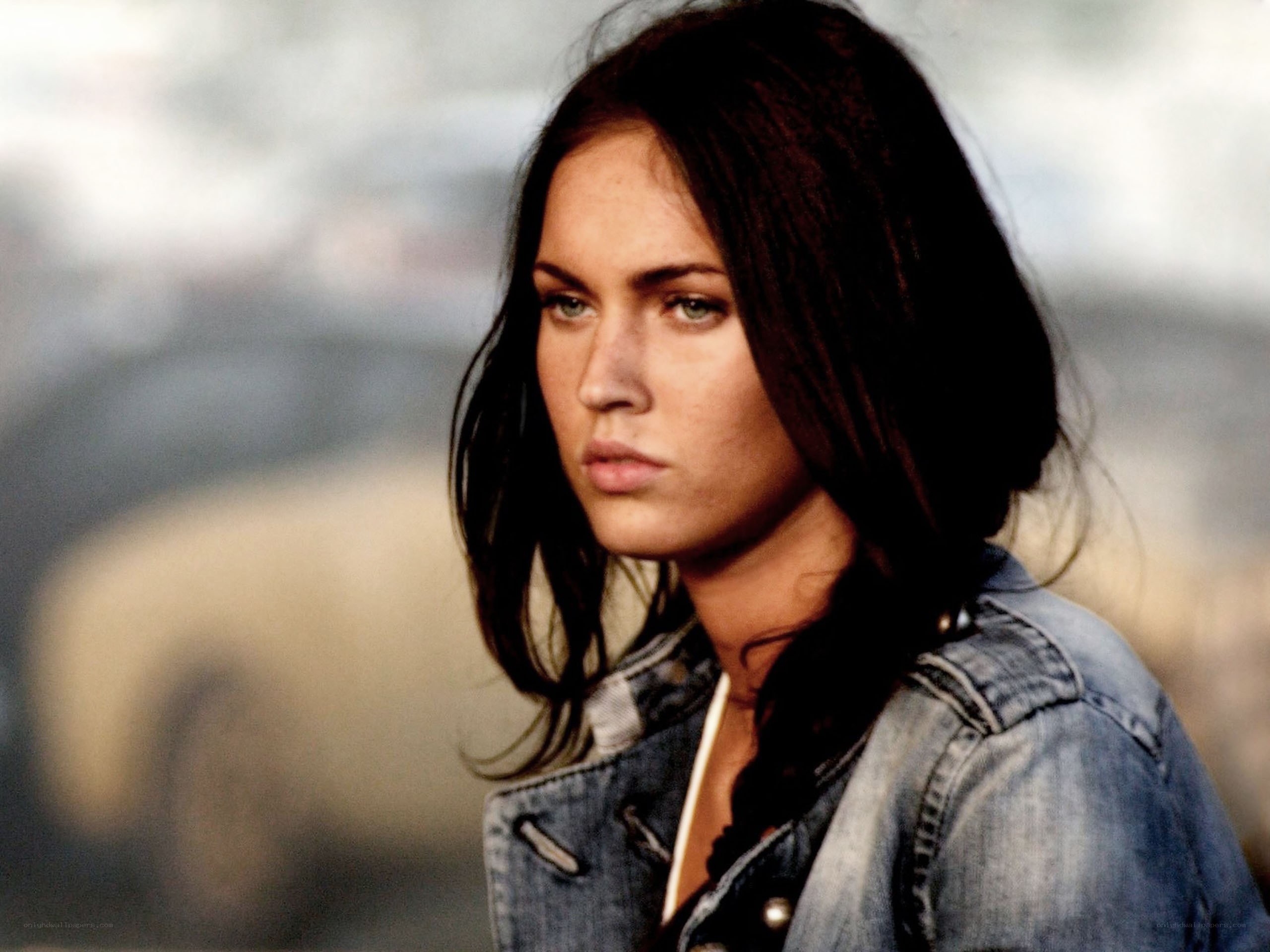 woman in denim jacket