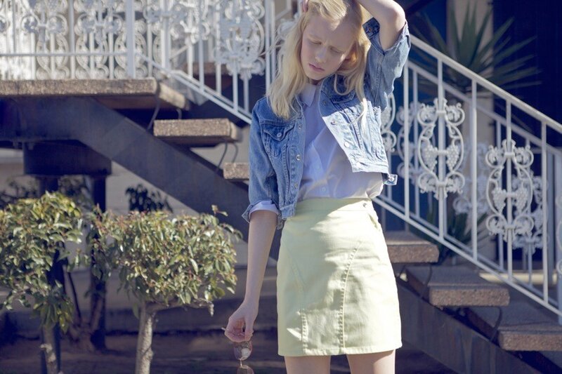 woman in denim jacket and skirt
