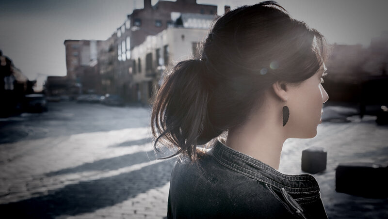 Woman in Denim Jacket — Gray, Dramatic, Afternoon