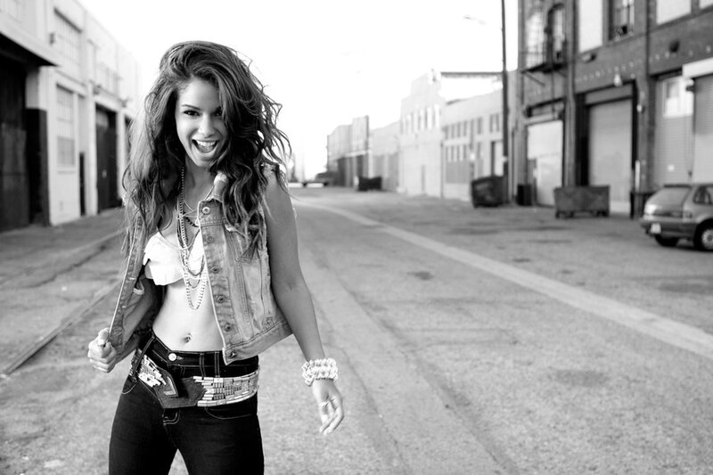 woman in denim jacket on street