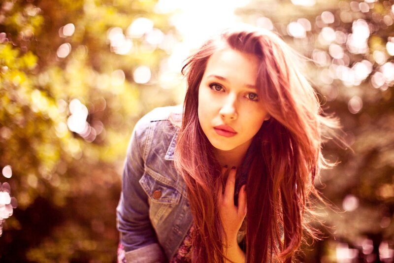 woman in denim jacket outdoors