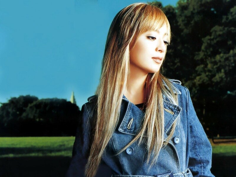 woman in denim jacket outdoors