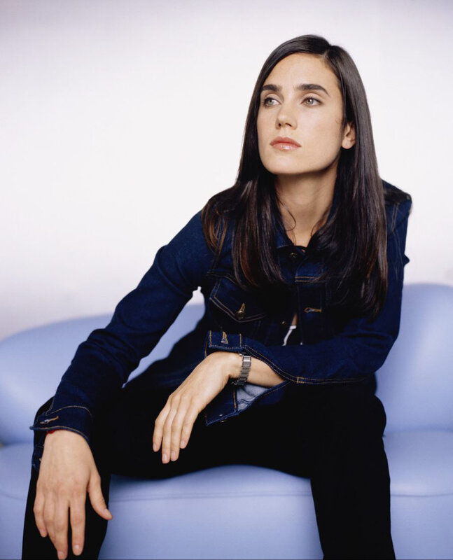 woman in denim jacket sitting