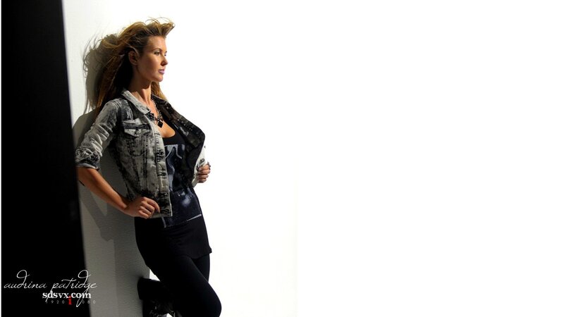 Woman in Denim Jacket — White, Dramatic